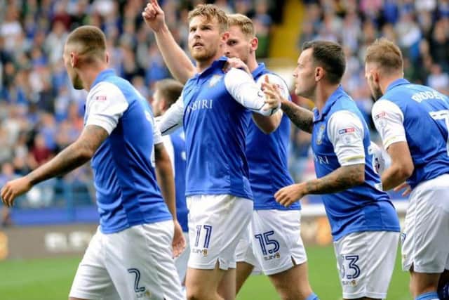 Sam Winnall celebrates scoring for Sheffield Wednesday against QPR