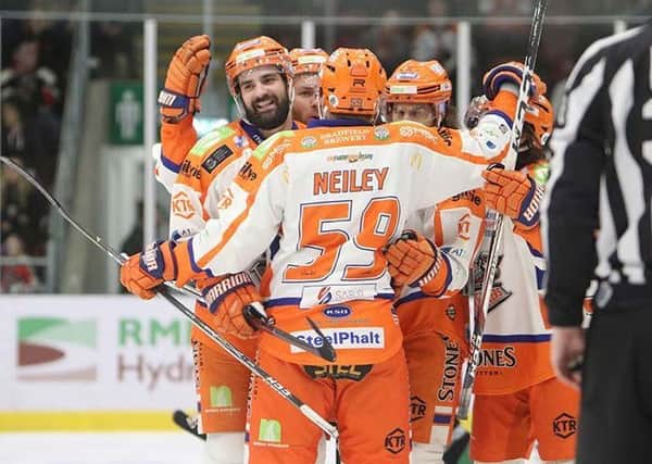 Mathieu Roy congratulates scorer Eric Neiley at Cardiff - more of this is now a must for the team