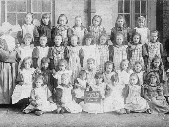 Reader John Scholey's picture of St Joseph's Convent School, Sheffield in the 1890s. His grandmother, Ellen McClory, who was born in 1888, is bottom right in the photo.Note the nun in all her finery