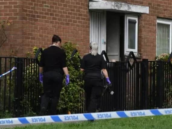 Officers on the Wensley estate after Sami Al-Soroori was stabbed to death