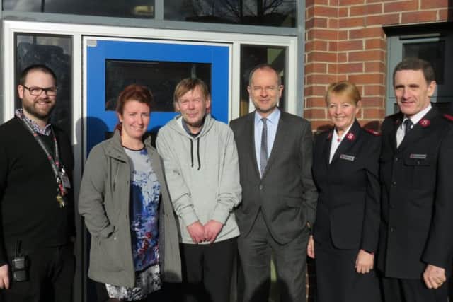 Louise Haigh, Richard and Paul Blomfield, centre, with staff.