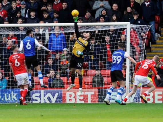 Joe Wildsmith saves from Oli McBurnie during the 1-1 draw between Sheffield Wednesday and Barnsley at Oakwell