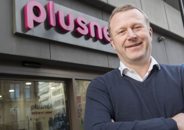 Chief executive Andy Baker celebrates outside Plusnet headquarters at The Balance in Sheffield. Pic Dean Atkins.