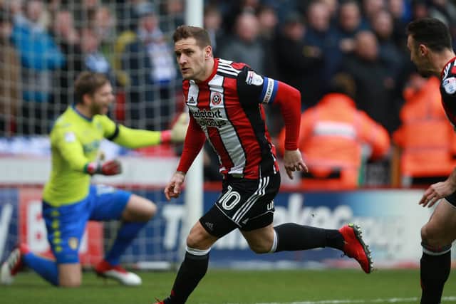 Blades striker Billy Sharp celebrates the first of his two goals against Leeds
