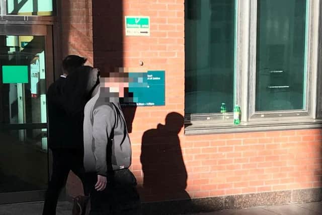 Convicted sex offender, Luke Cannon, hid his face as he walked out of court