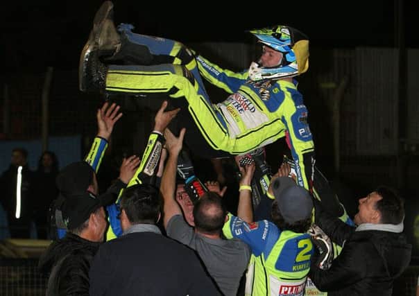 Bumps for Kyle Howarth as the Sheffield Tigers speedway team celebrate winning the Championship trophy. Pic by Phil Hilton