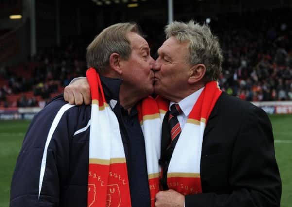Tony Currie and Alan Birchenall (left) recreate their famous kissÂ© BLADES SPORTS PHOTOGRAPHY