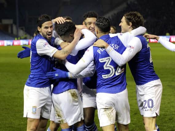 Sheffield Wednesday players celebrate after Lucas Joao fired in his second against Derby County