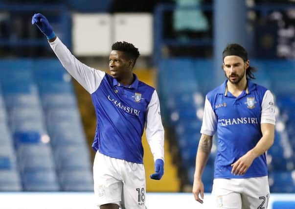 Sheffield Wednesday's Lucas Joao (middle) celebrates scoring the game's first goal against Derby County. Picture: Martin Rickett/PA Wire