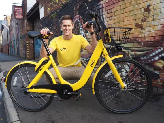 Adam Rose with one of the Ofo bikes