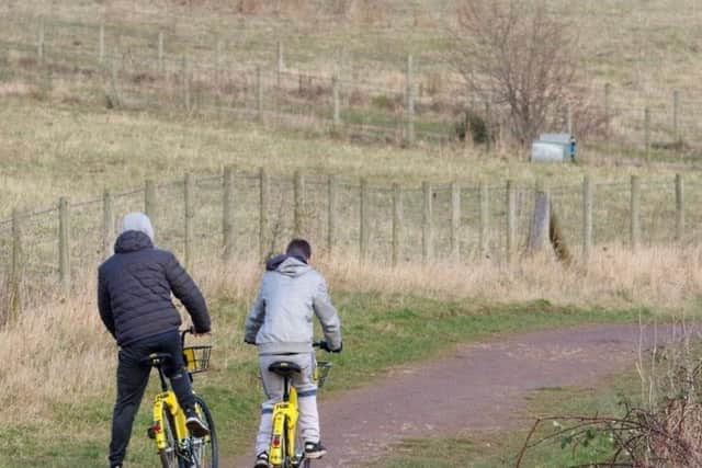 This pair were spotted riding the yellow bikes six miles outside Sheffield city centre (photo: Simon Dell)