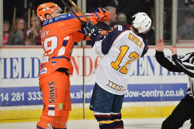 Eric Neiley making friends in Saturday's match against Guildford Flames. Pic: Dean Woolley