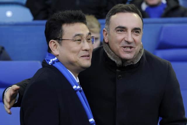 Carlos Carvalhal remains good friends with Owls chairman Dejphon Chansiri, left