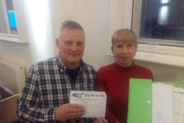Sandra Haith and David Hatfield with their petition opposing the routing of high-speed trains through Bramley