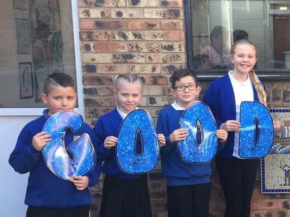 Students at Emmanuel Junior Academy, in Waterthorpe celebrate the Ofsted