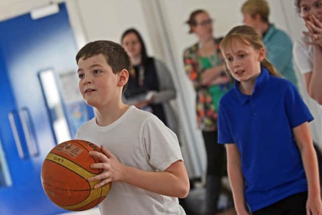 Sarp Kaya, pictured, taking part in the Sharks Basketball session. Picture: Marie Caley.