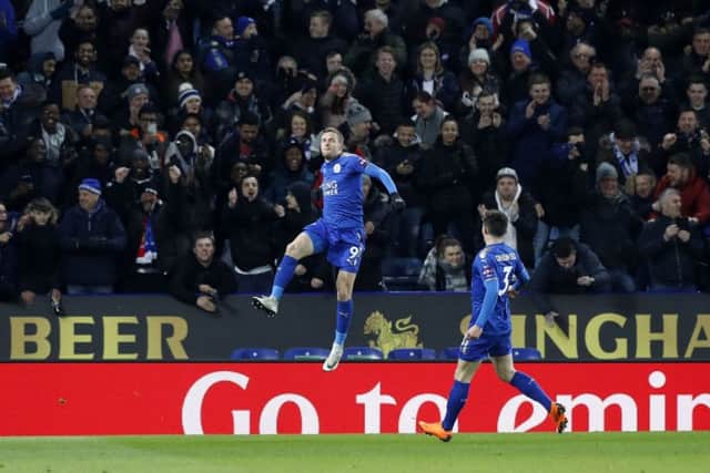 Leicester City's Jamie Vardy (left) celebrates scoring his side's first goal of the game during the Emirates FA Cup, Fifth Round match at the King Power Stadium, Leicester. PRESS ASSOCIATION Photo.