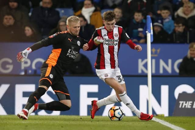 David Brooks of Sheffield Utd beats Kasper Schmeichel of Leicester City to the ball but is pushed off by the big Dane during the FA cup fifth round match at the King Power Stadium, Leicester.  Simon Bellis/Sportimage