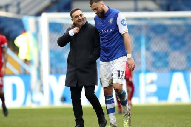 Swansea City boss Carlos Carvalhal with his former player, Sheffield Wednesday striker Atdhe Nuhiu. Pic: SportImage