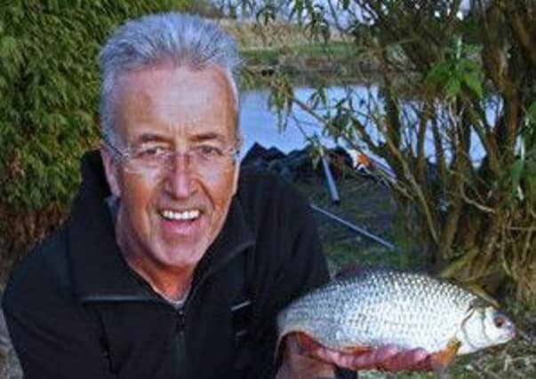 Bob Roberts with a nice net of fish from Pool Bridge Farm