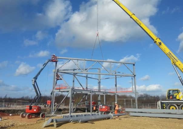 Steelwork rises on the Boeing factory