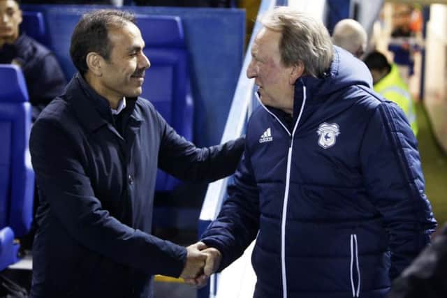 Neil Warnock shakes hands with current Owls boss Jos Luhukay at Hillsborough last month