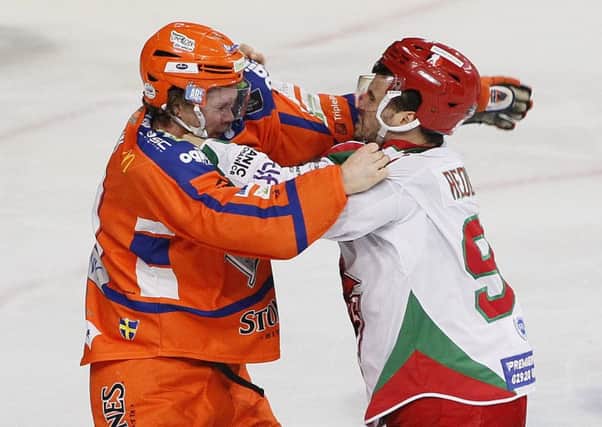 Andreas Jamtin fights with Bryce Reddick. Picture by Hayley Roberts