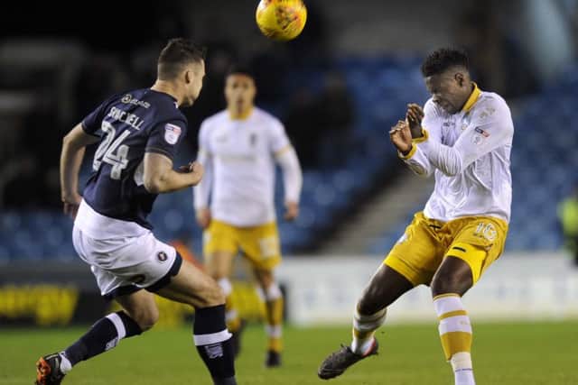 Owls striker Lucas Joao who came on in the second half with Millwall's Jason Shachell.....Pic Steve Ellis