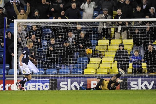 GOAL.....Millwalls Steve Morrison beats Owls keeper Joe Wildsmith for their second goal....Pic Steve Ellis