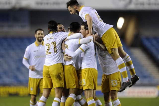 GOAL...Owls Joey Pelupessy scores.....Piuc Steve Ellis