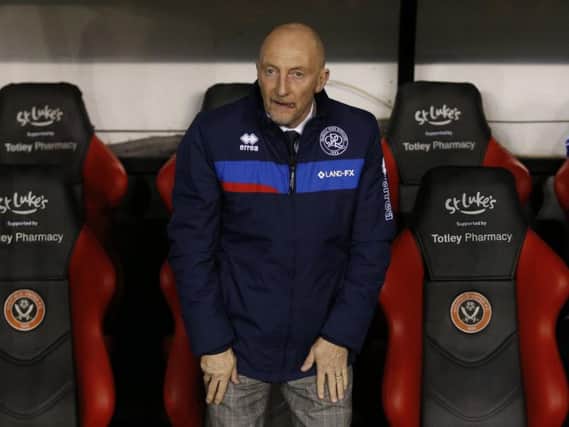 QPR manager Ian Holloway takes his seat in the dug out at Bramall Lane