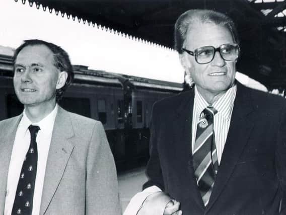 Billy Graham, complete with Sheffield United tie, arrives in the city in 1985.