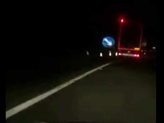 The lorry narrowly misses a sign on the A1.