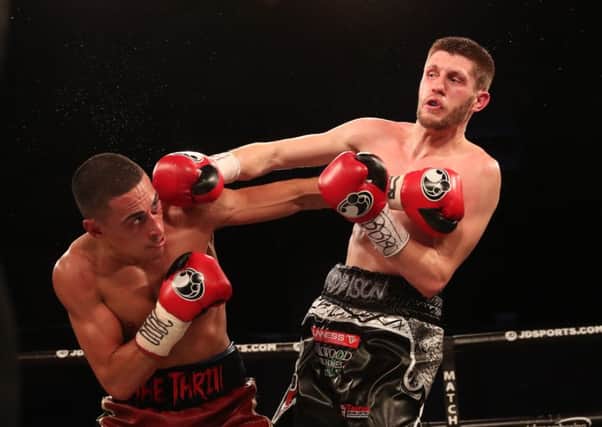 Jason Cunningham (right) in action against Jordan Gill. Picture: Lawrence Lustig/Matchroom