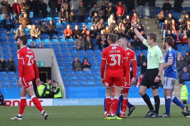 Picture by Gareth Williams/AHPIX.com; Football; Sky Bet League Two; Chesterfield FC v Swindon Town; 24/03/2018 KO 15.00; Proact Stadium; copyright picture; Howard Roe/AHPIX.com; Swindon's Ollie Banks is sent off for a high challenge on Chesterfield's Louis Reed