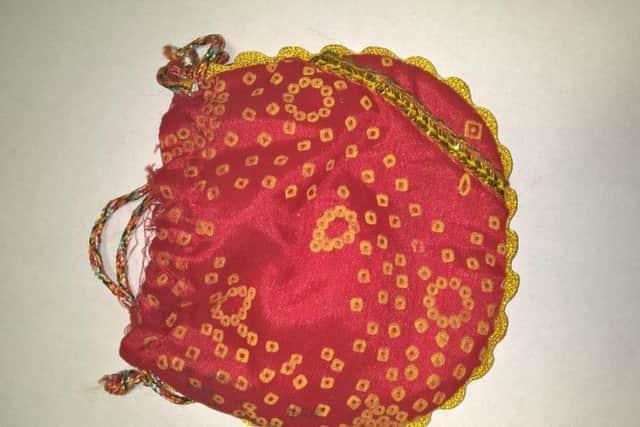 The medals were found in this pouch.