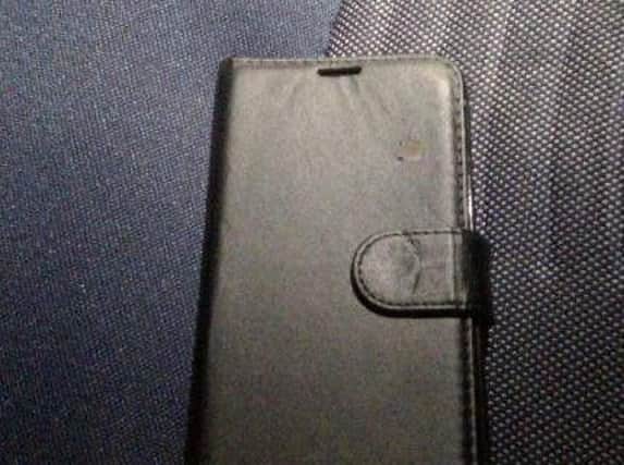 The phone which was left in the stolen car.