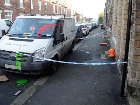A van is cordoned off by the police on Netherfield Road.