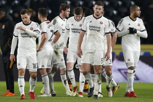 Dejected Sheffield United players after Friday night's defeat to Hull City
