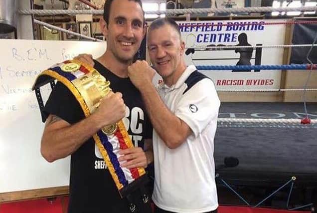 Scott Westgarth pictured with trianer Glyn Rhodes.