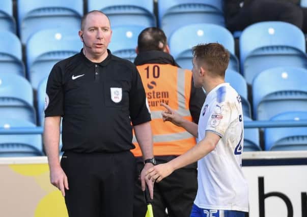 ChesterfieldÃ¢Â¬"s Louis Reed confronts the assistant referee who rules out his goal: Picture by Steve Flynn/AHPIX.com, Football: Skybet League One match Carlisle United -V- Chesterfield  at Brunton Park, Carlisle, Cumbria, England on copyright picture Howard Roe 07973 739229