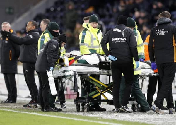 Barnsley's Adam Jackson is taken off on a stretcher during the Sky Bet Championship match at the KCOM Stadium, Hull.