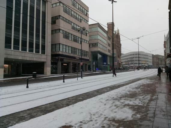 Snow on High Street, Sheffield this morning. Picture: Sam Cooper.