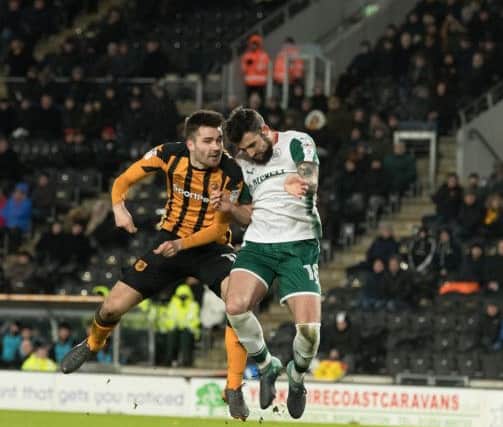 Clash of heads  between Jon Toral and Barnsley's  Adam Jackson who was stretchered  off.
Hull City v Barnsley FC.  SkyBet Championship.  KCOM Stadium.
27 February 2018.  Picture Bruce Rollinson
