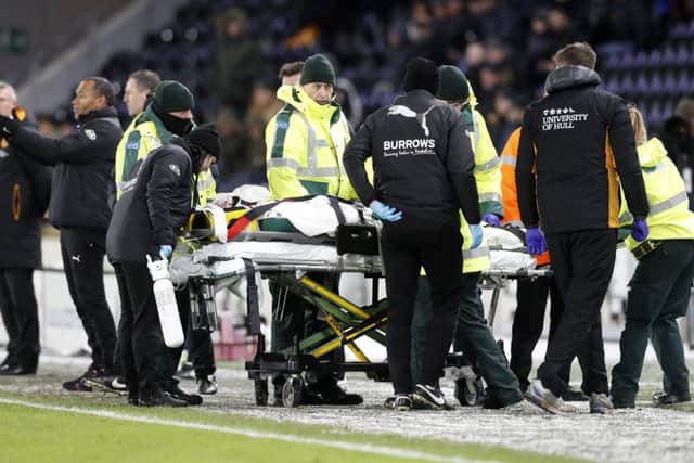Barnsley's Adam Jackson is taken off on a stretcher during the Sky Bet Championship match at the KCOM Stadium, Hull. PRESS ASSOCIATION Photo.