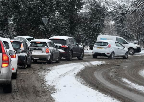 Traffic in the snow on Doncaster Road, Barnby Dun.