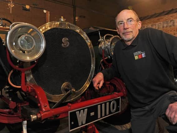 Engineer Keith Wall with the 1908 Sheffield-Simplex car at Kelham Island Museum. Picture: Andrew Roe