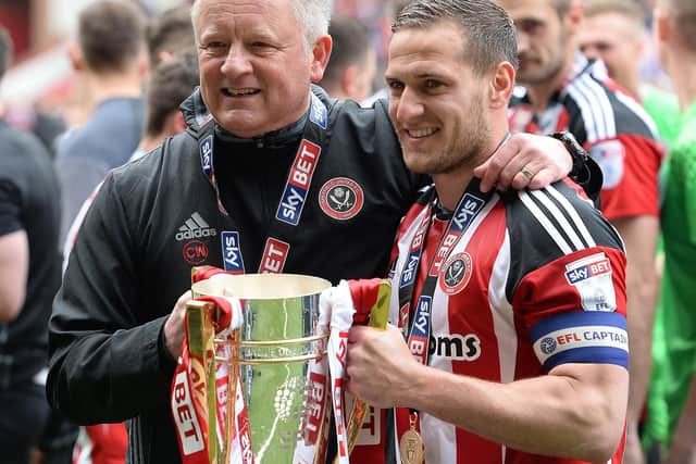 Blades fans Chris Wilder and Billy Sharp led United to the League One title last season