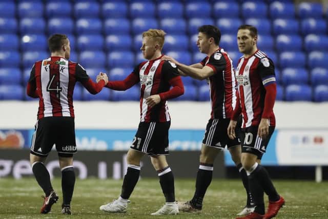 Mark Duffy is congratulated on his goal: David Klein/Sportimage