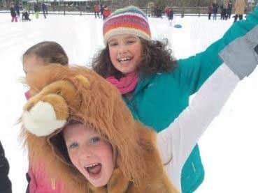Pupils at Dobcroft Infant and Junior Schools enjoy the snow